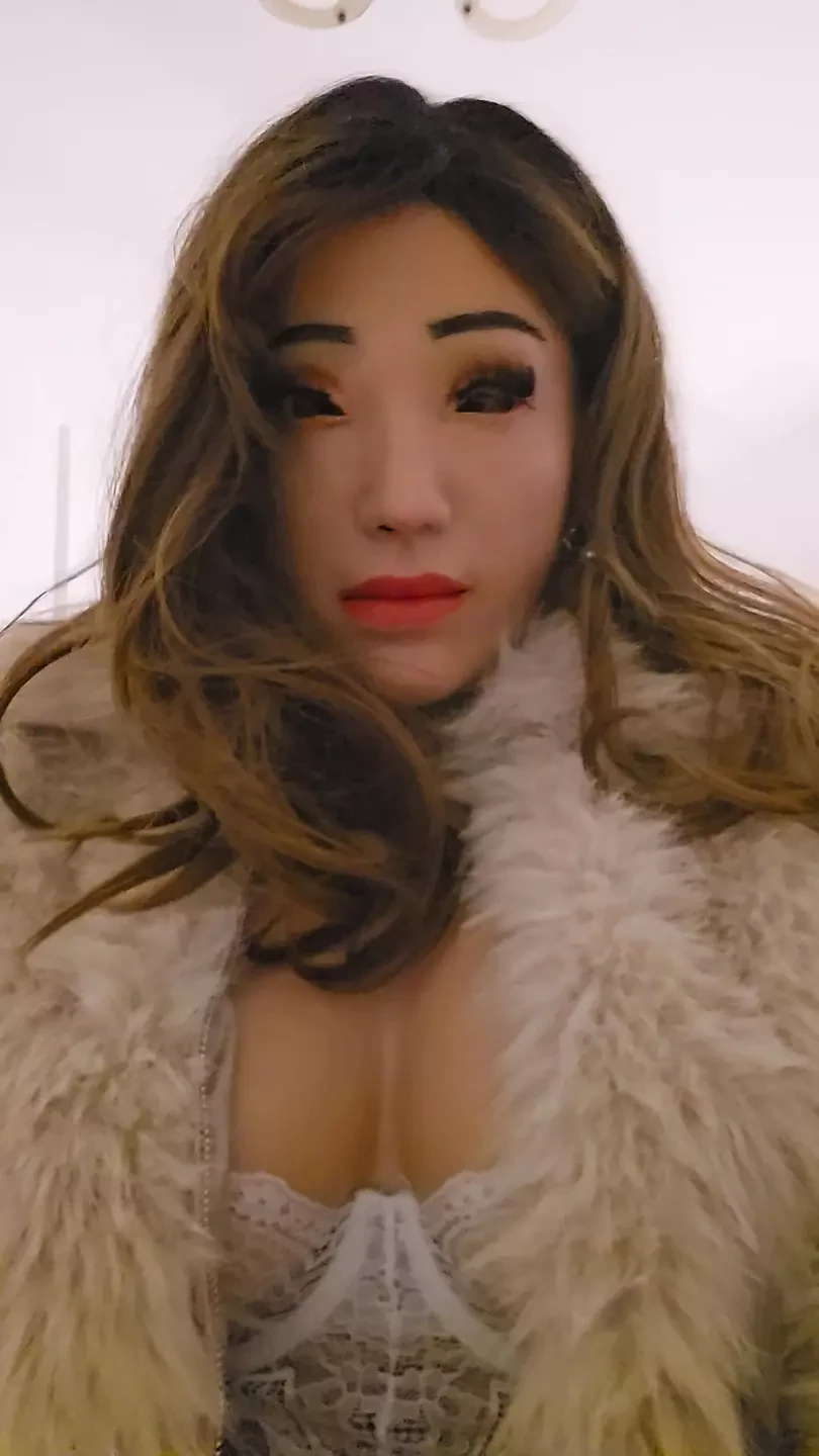 Crossdresser in white lingerie