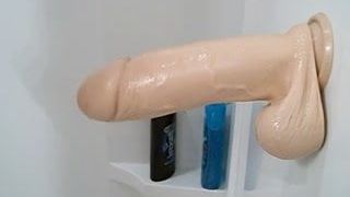Fun in the shower with thick dildo