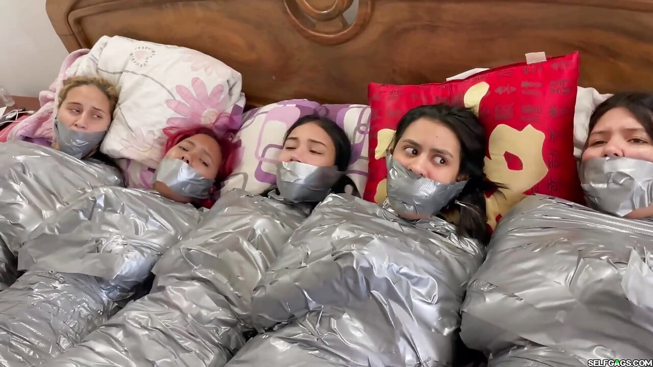 5 Mummified Girls Struggle All Wrapped up and Gagged!