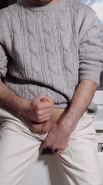 Emotional moment from "A young guy jerks off his dick and cums loudly"