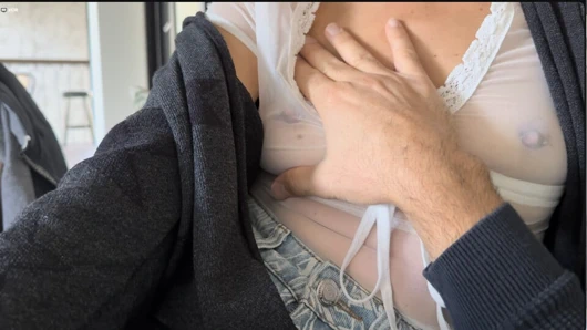 Drinking coffee in a see through shirt exposing pierced nipples in public cafe while my husband touches my boobs