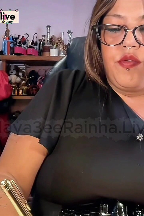 Brazilian BBW MILF Goddess Green Eyes Red Lips Red Nails Chain Smoking Ignoring You