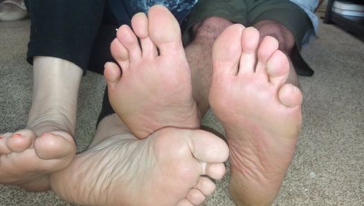 Two pair of feet to stroke your cock too