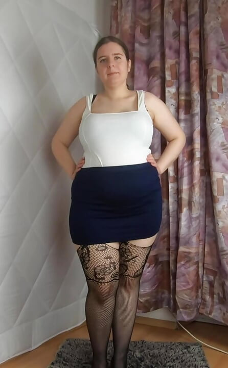 Mini skirt heels and fishnet stockings