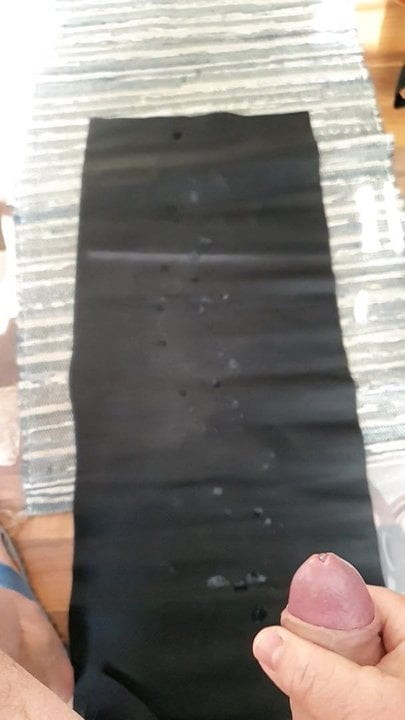huge massive cumshot on black leather