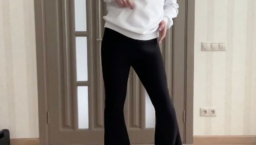 Sissy in flared boot cut black trousers and white hoodie with roses masturbating and dancing for your pleasure