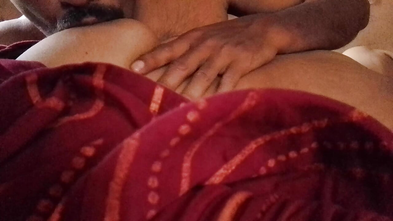 Husband sucks Indian housewife's boobs