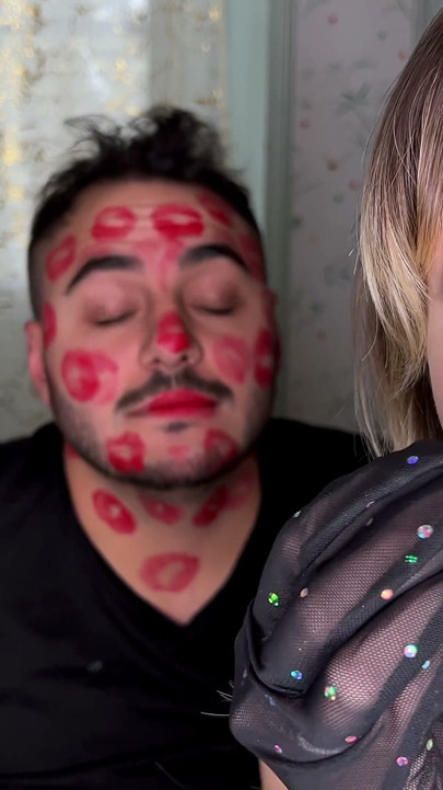Red Lipstick Kisses Cover His Entire Face