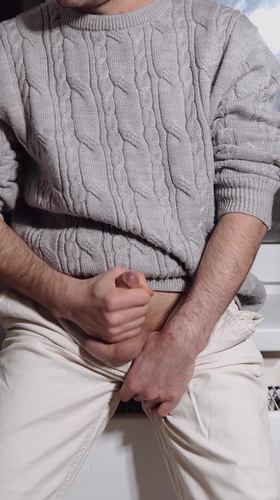Emotional moment from "A young guy jerks off his dick and cums loudly"