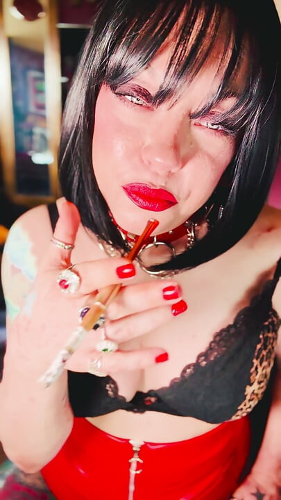 A Stunning Brit Smokes A Cigarette Using A Holder - Tina Snua Smoking Smoker Leather Bra