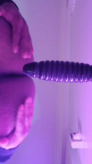 Anal dildo suction to door and inserting in ass from below