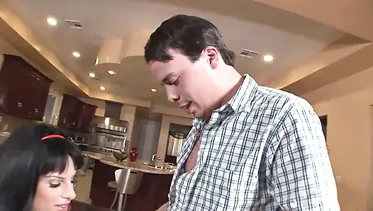 Young brunette eats a huge cock