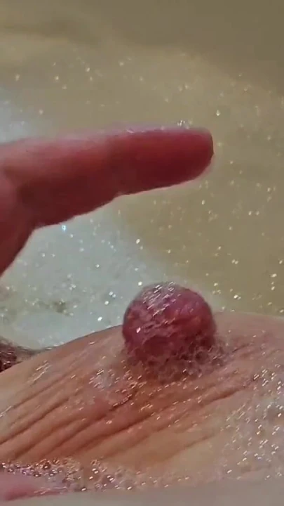 Stunning moment from "Sensual BBW Bath with Nipple and Belly Play"