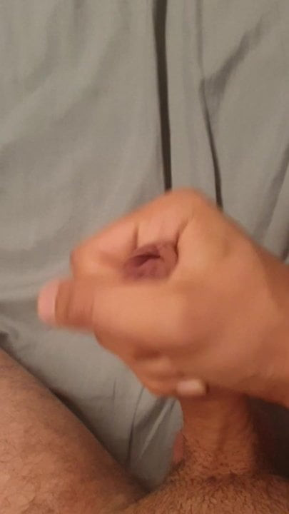 Masturbating