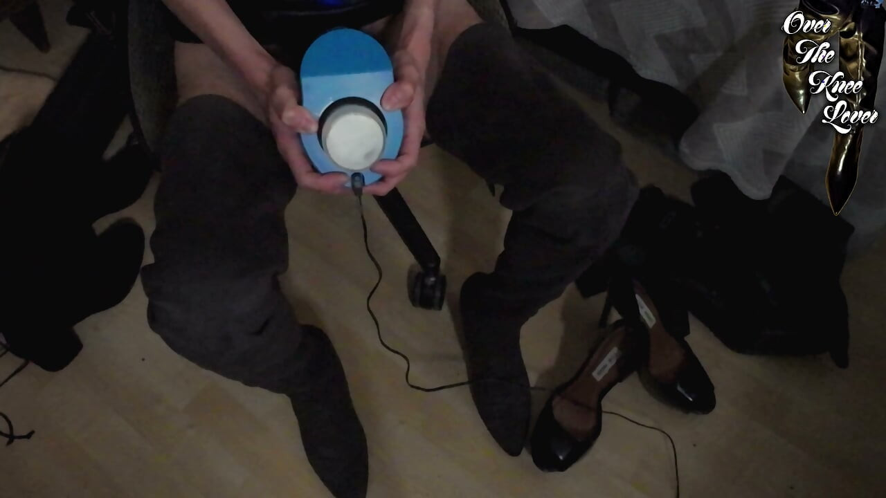 crossdresser autoblows in a leather dress and suede thigh high boots