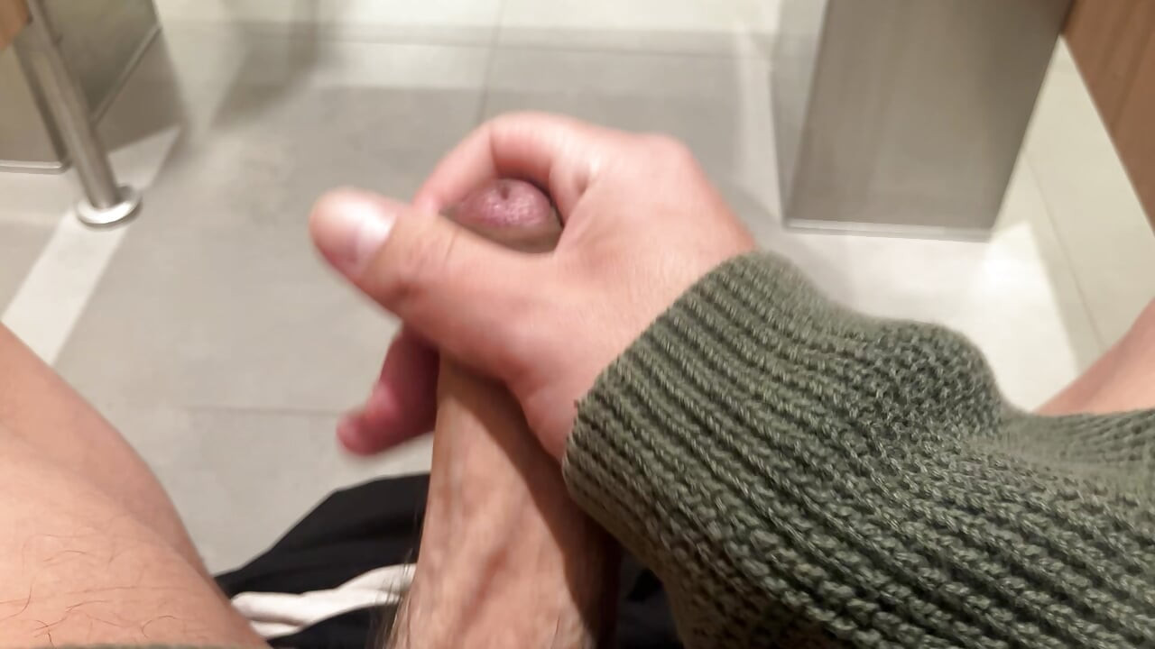 jerking off at the airport's restroom