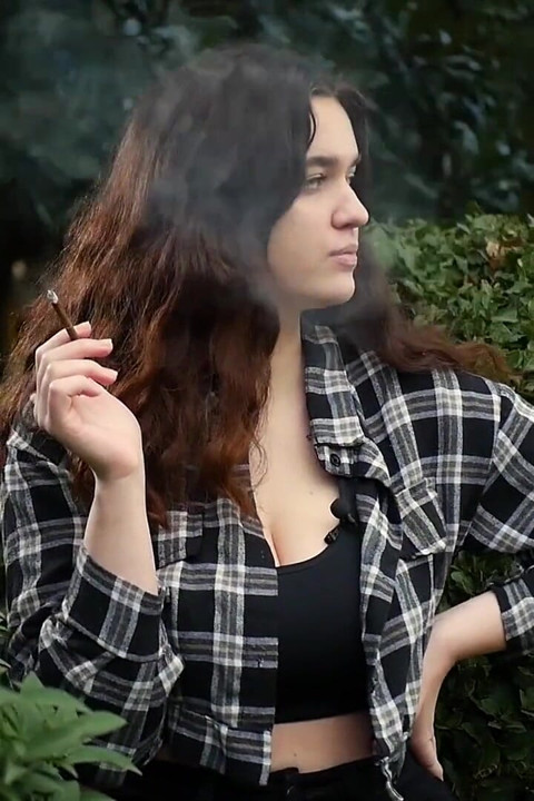 Sweet and Busty Russian Babe Smoking Cigarette in Nature