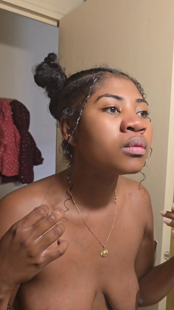 Iconic moment from "Beautiful Ebony Makes Its Toilet"