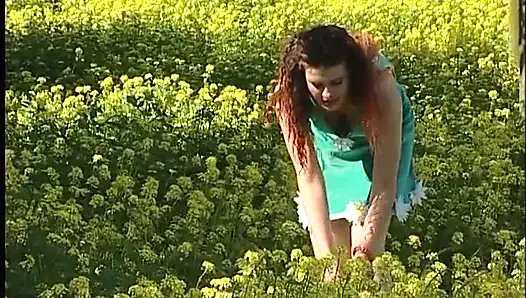 Busty redhead teen lifting dress outdoors