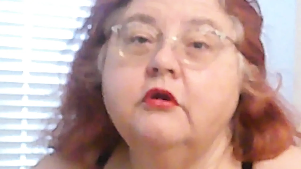 Mature BBW Redhead Nurse Vicki Talks to You as She Makes a Lipstick Applying Video for You!