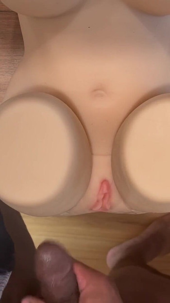 Iconic moment from "Crossdresser Prematurely Ejaculates On Sex Doll After Edging For Hours"