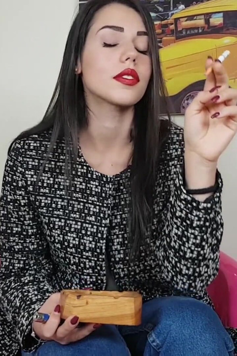 Italian beauty loves smoking cigars