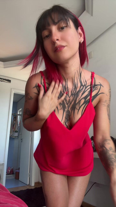tattooed latina red dress