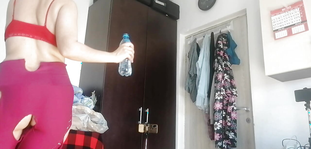 Amateur wife has fun trying on clothes and cutting them. Amateur wife vacuuming naked in the house.