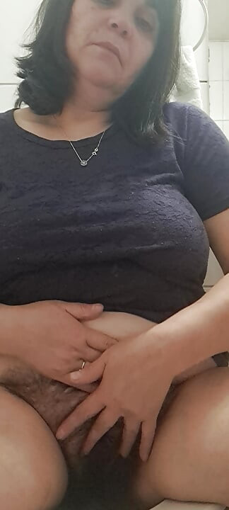Stepmom is a whore, she shows her stepson in front of the camera her pussy to turn him on