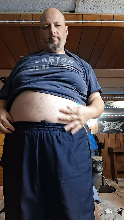 Chubby guy strips and dances