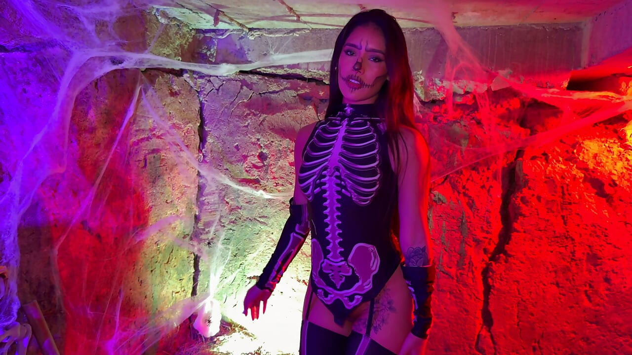 Petite Colombian woman gets aroused upon seeing a skeleton on Halloween night - Carolina Guerrero