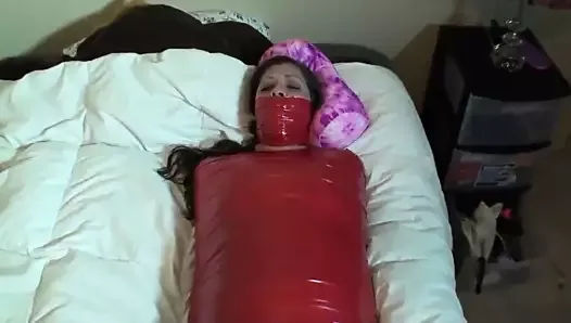 Hot brunette mummified by tape and vibed