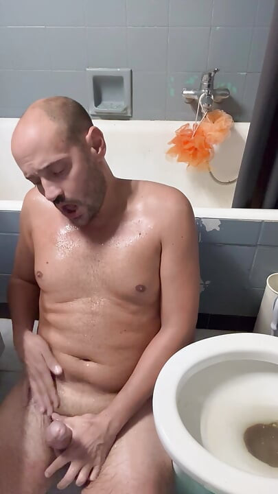 Gooning near the toilet bowl