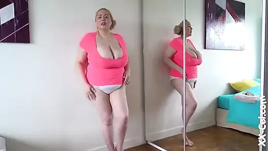 Blonde BBW Dalila Oils Up Her Massive Natural Titties Before Shaking Them Around