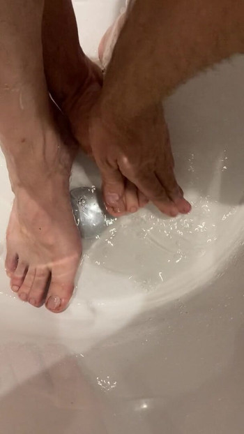 Steve Ford washes feet