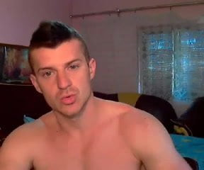 Hunky guy jerks off on cam