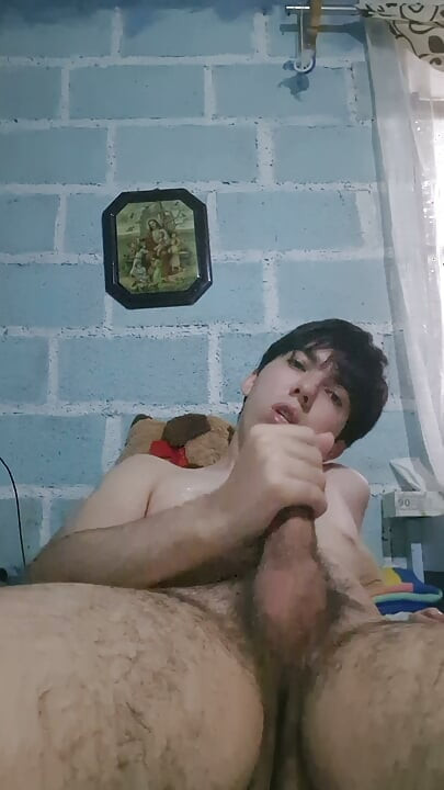 Horny young man masturbates alone and naked