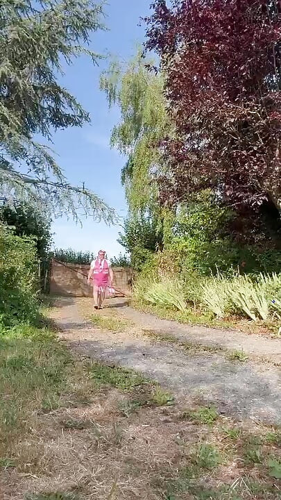 Dressed in a tight pink dress for an evening out