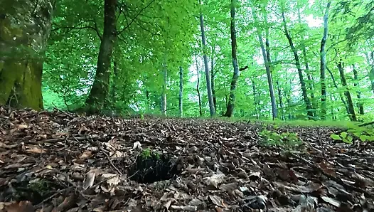 A voyeur watches me pee in the woods, and I reward him with a handjob, and he cums on my hairy pussy.