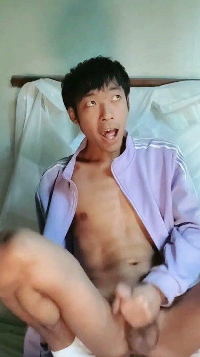 Cute Asian boy masturbates, moans, cums and eats cum on the small bed in the old factory duty room | Clip 1