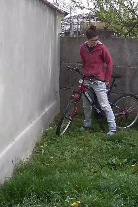 Pissing in the backyard on a cold day, and leaving on her bike
