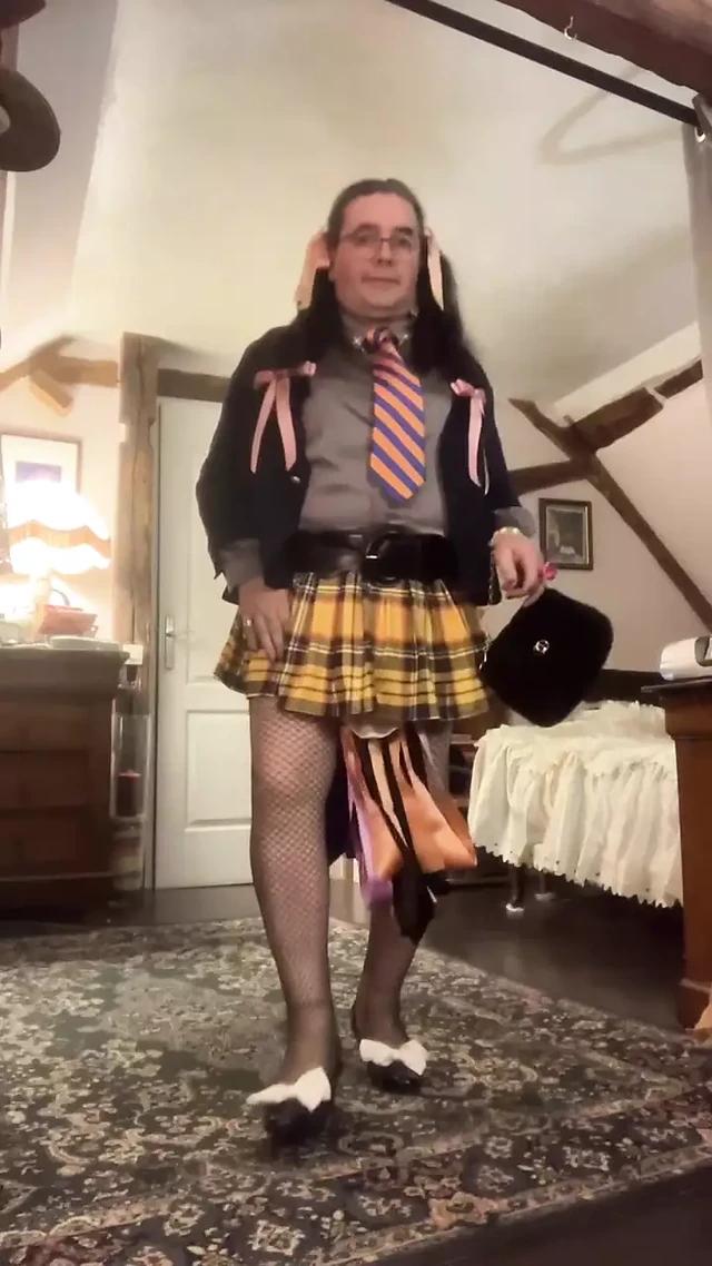 In a little schoolgirl outfit with a little yellow plaid skirt for a night out