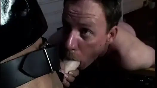 Ugly dyke Raquel in black latex outfit makes dude lick her big pleasure bud and regaled him with a big strap-on