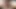 Busty teen Lillith pounds her pussy with a big dildo