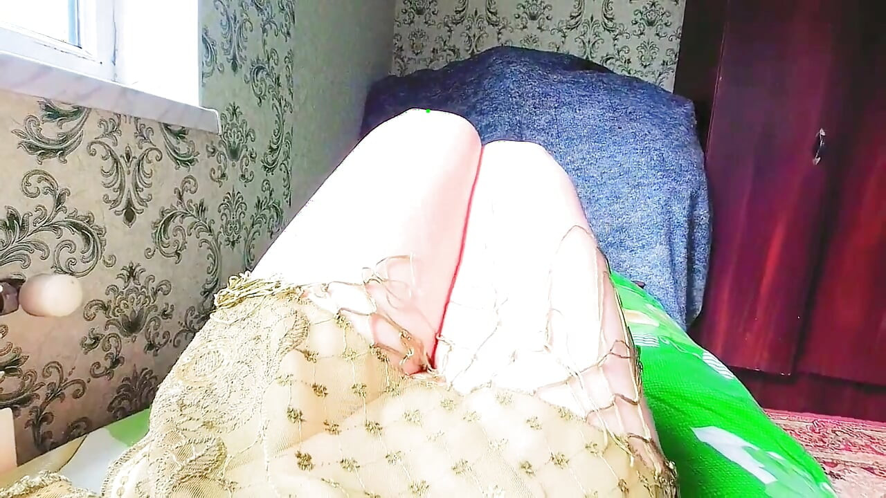Playful trans girl showing thigh tattoo in short skirt