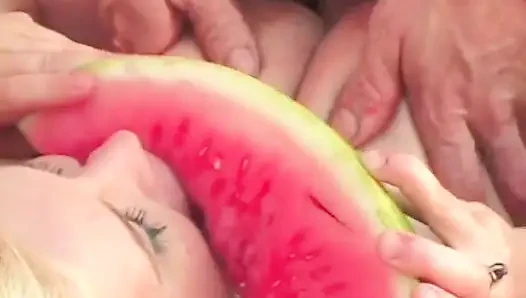 Kinky dude and blonde with huge tits get playful with a water melon then fuck outdoors