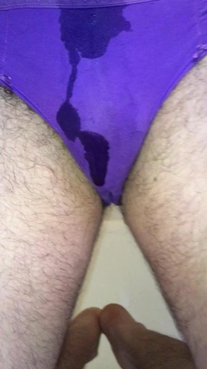 Pissing in freshly cum stained purple panties