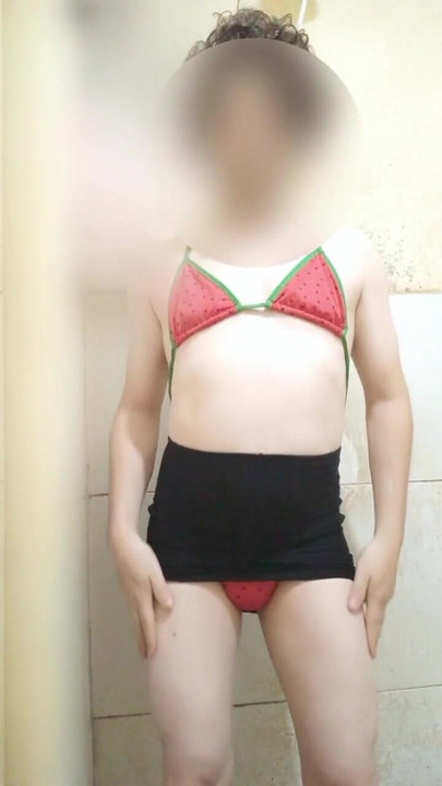 Key moment from "Wearing a Brazilian miniskirt and bikini"