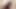 Latex Alice blows and deep throats a dildo while on her knees in the bathroom