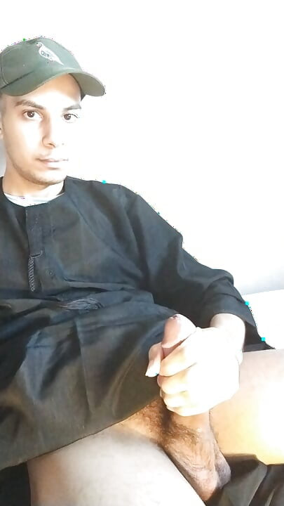 Arab daddy with a mustache shakes his big cock